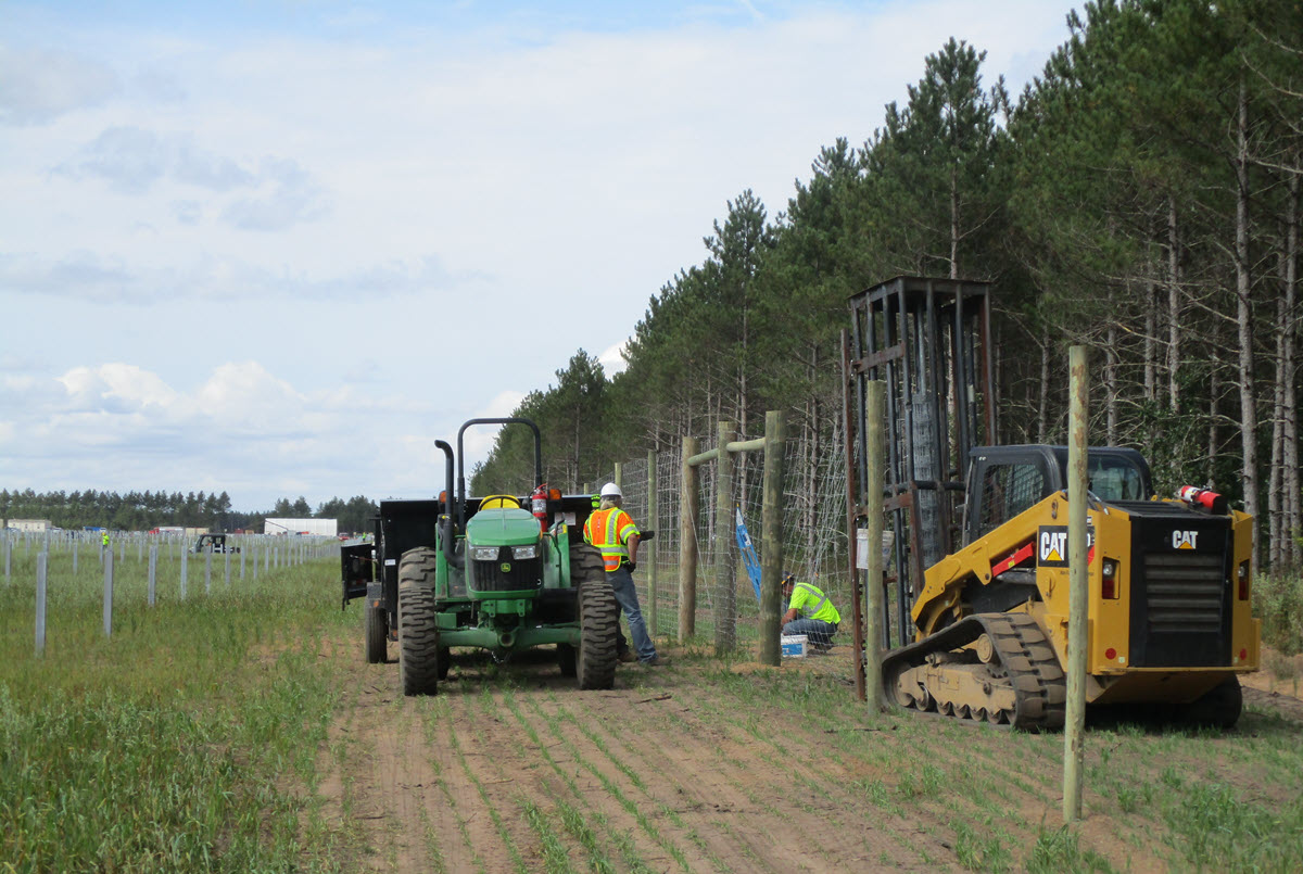 Woven wire fence installation at the Wood County Solar Project